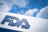 A photo of a sign with the FDA's logo outside its headquarters.