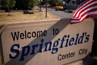 A photo of a sign that reads "Welcome to Springfield's Center City."