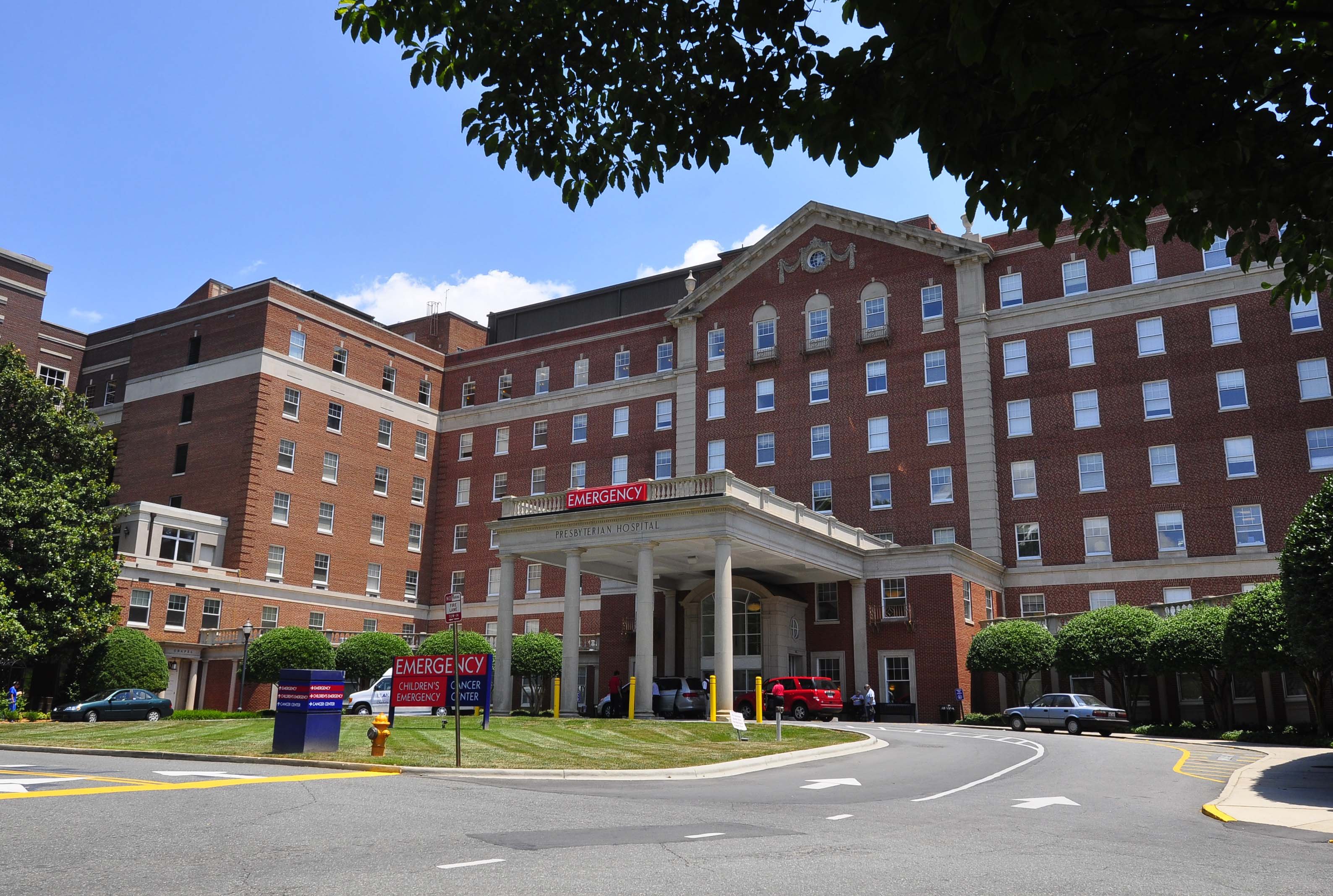 An exterior photograph of the Novant Health Presbyterian Medical Center on a sunny day.